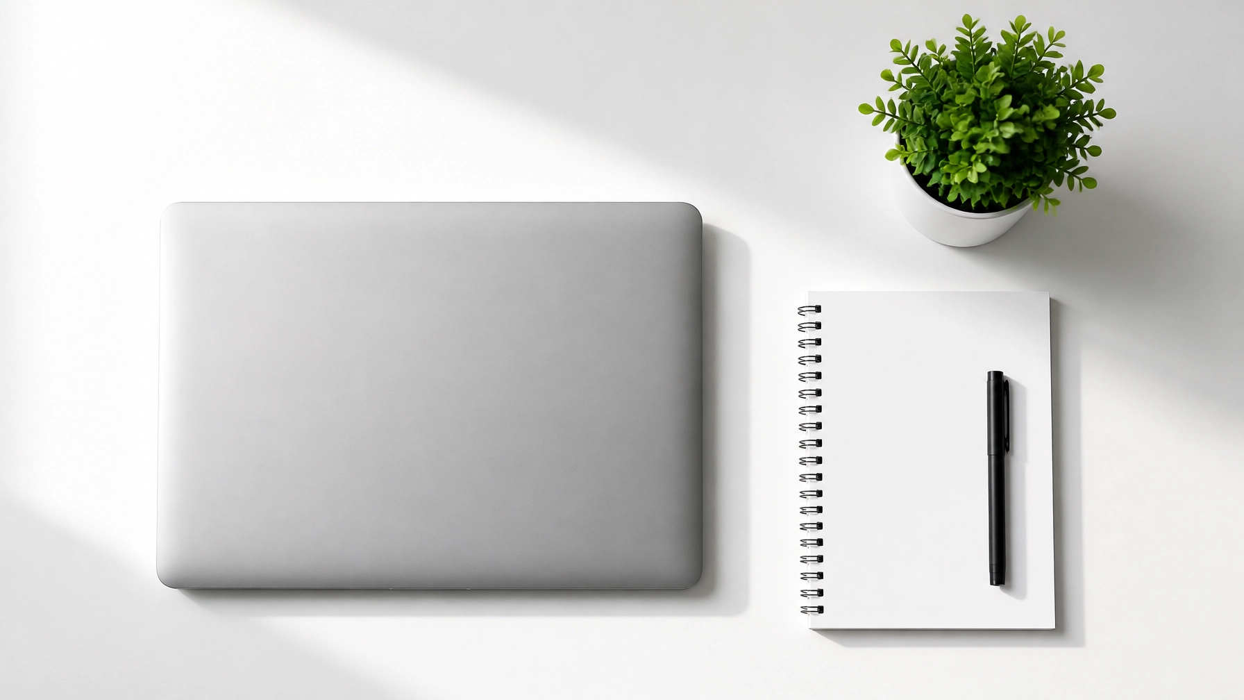 A perfectly organized and minimalist workspace, representing the peace of mind provided by professional managed services.
