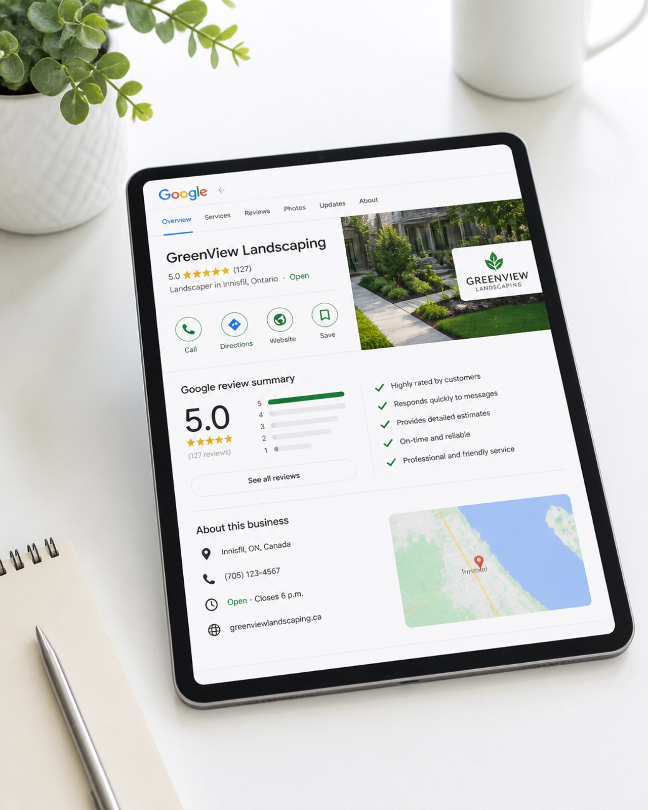A high-quality, minimalistic photograph of a digital tablet on a clean white table. The screen shows a Google Business Profile listing for a local business in a neighbourhood like Innisfil, with high ratings and green checkmarks. Bright natural lighting, white and green theme, very clean and professional.
