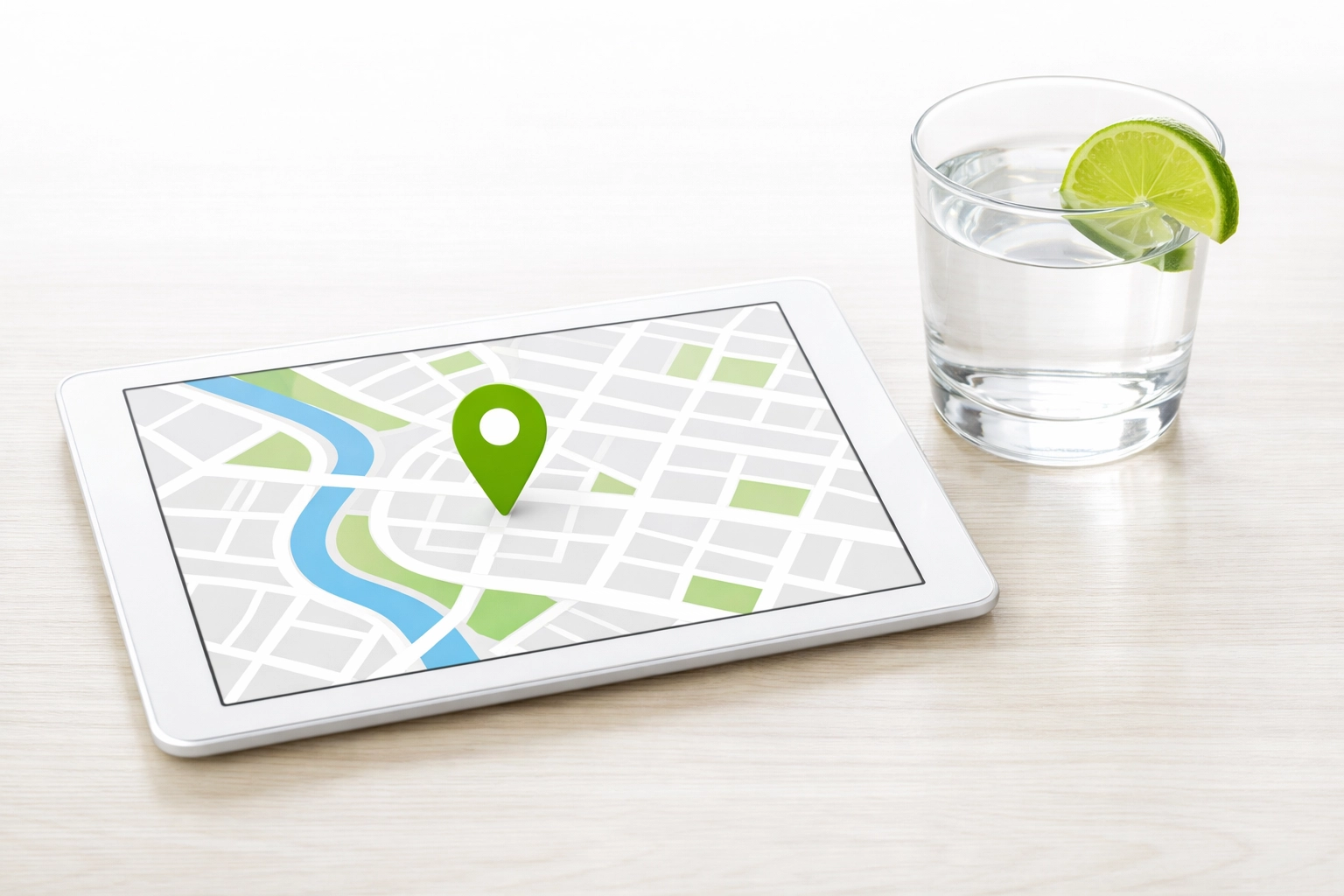 A tablet showing a digital map with a location pin to represent local SEO and Google Business Profile mapping.