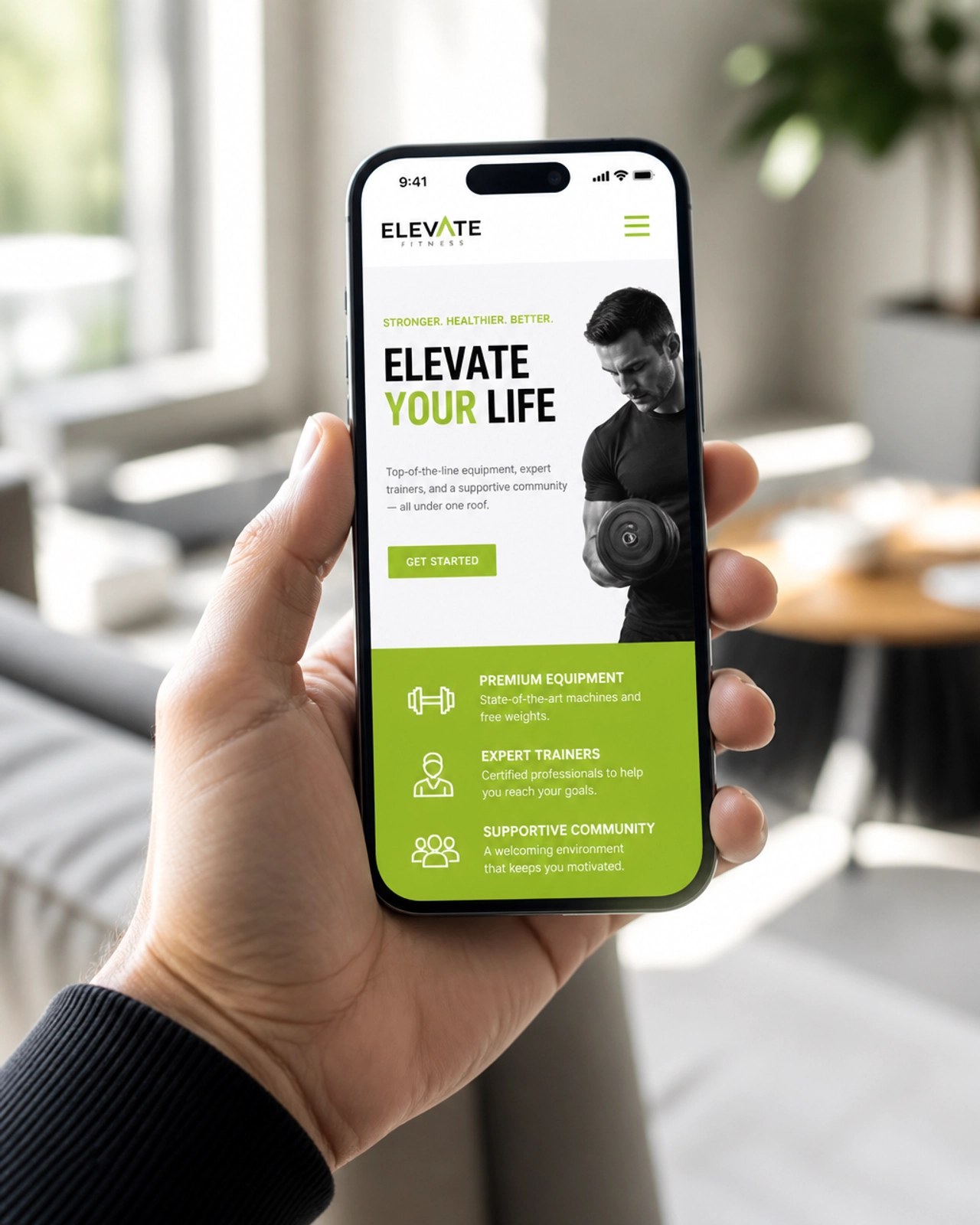 A person holding a smartphone showing a responsive and modern website for a local service business.