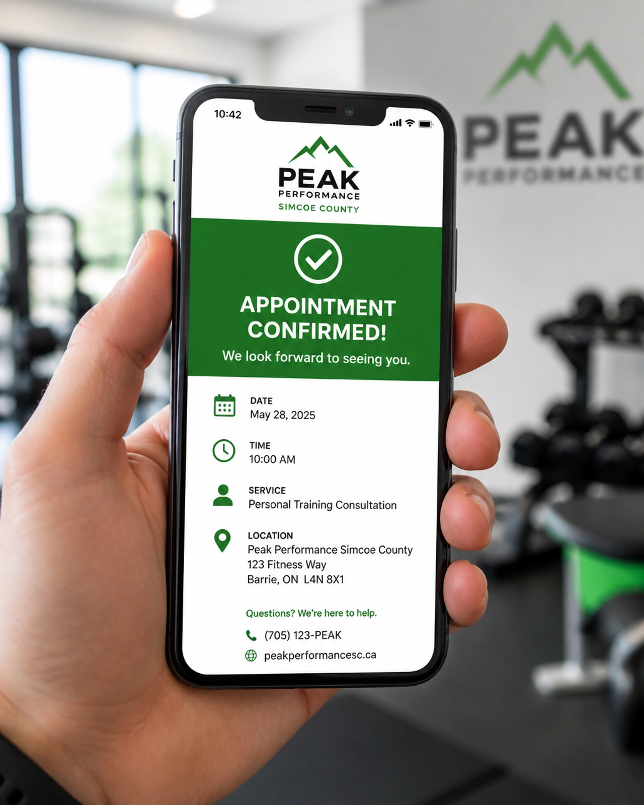 A close-up of a smartphone showing a clear and professional appointment confirmation for a local gym, reflecting modern convenience.