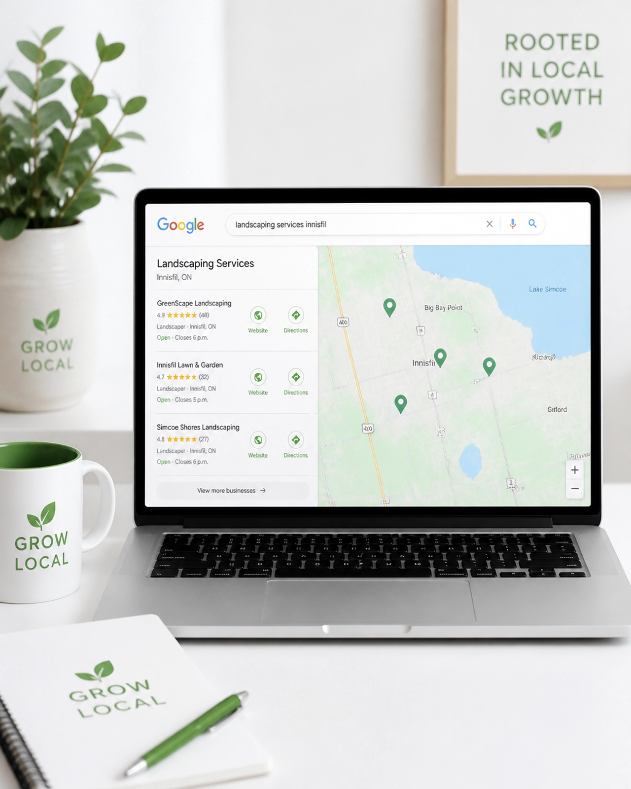 A laptop screen showing a Google Map with green location pins over a local neighbourhood.